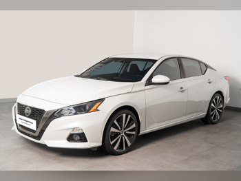 Nissan  Altima  2.5 S  2022  Automatic  72,596 Km  4 Cylinder  Front Wheel Drive (FWD)  Sedan  White  With Warranty
