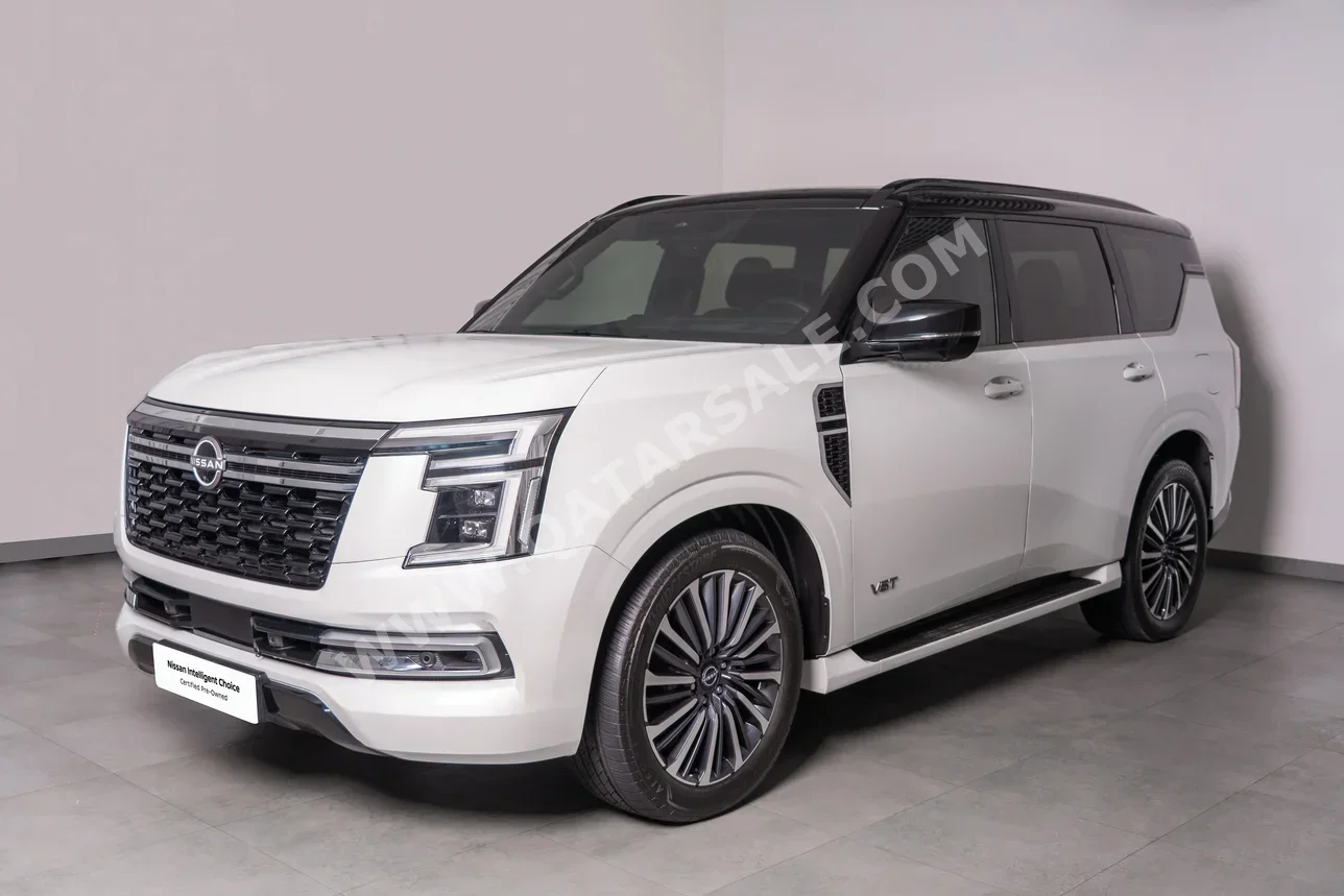 نيسان باترول ال اي بلاتينيوم 2025 اوتوماتيك 29,200 كم 6 سلندر دفع رباعي اس يو في أبيض تحت الضمان