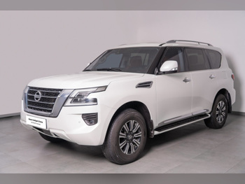 Nissan  Patrol  SE Titanium  2020  Automatic  197,000 Km  6 Cylinder  Four Wheel Drive (4WD)  SUV  White