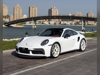 بورش  911  توربو اس  2020  اوتوماتيك  25,000 كم  6 سلندر  دفع خلفي  كوبيه \ سبورت  أبيض  تحت الضمان