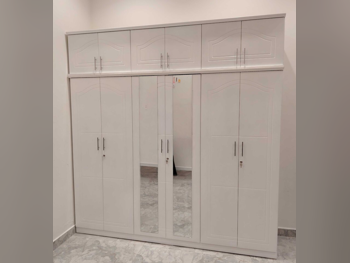 خزائن ودواليب الملابس والزينة - دوحة فيرنيتشر - خزائن - أبيض