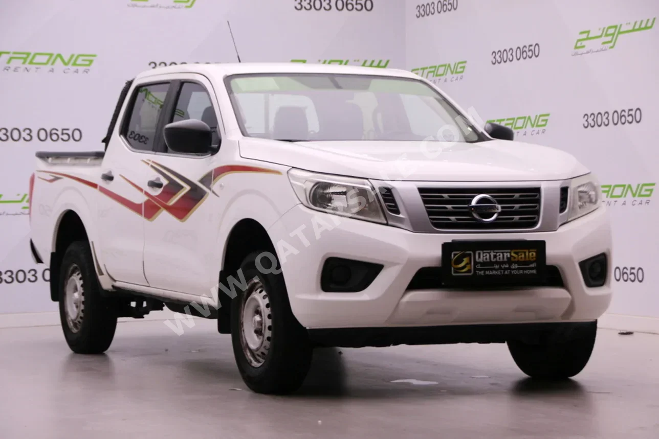 نيسان نافارا 2020 عادي 92,000 كم 4 سلندر دفع خلفي بيكب أبيض