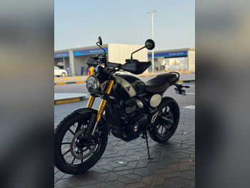 تريمف سكرامبلر 400 اكس - 2024 - اللون اخضر مطفي - الضمان