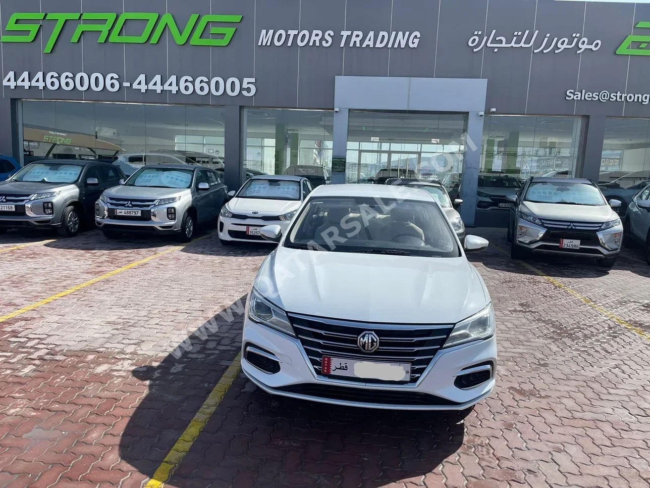 MG  5  2022  Automatic  70,000 Km  4 Cylinder  Front Wheel Drive (FWD)  Sedan  White  With Warranty