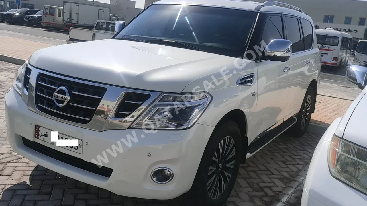 Nissan Patrol Platinum 2014 Automatic 289,000 Km 8 Cylinder Four Wheel Drive (4WD) SUV White