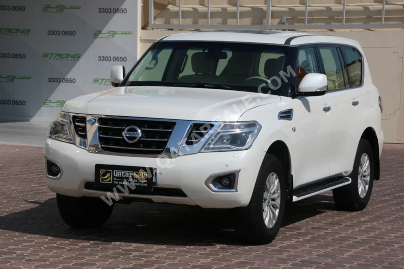 Nissan  Patrol  SE  2014  Automatic  350,000 Km  8 Cylinder  Four Wheel Drive (4WD)  SUV  White