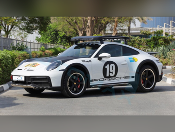 بورش  911  داكار  2023  اوتوماتيك  12,990 كم  6 سلندر  دفع كلي مستمر  كوبيه \ سبورت  أبيض
