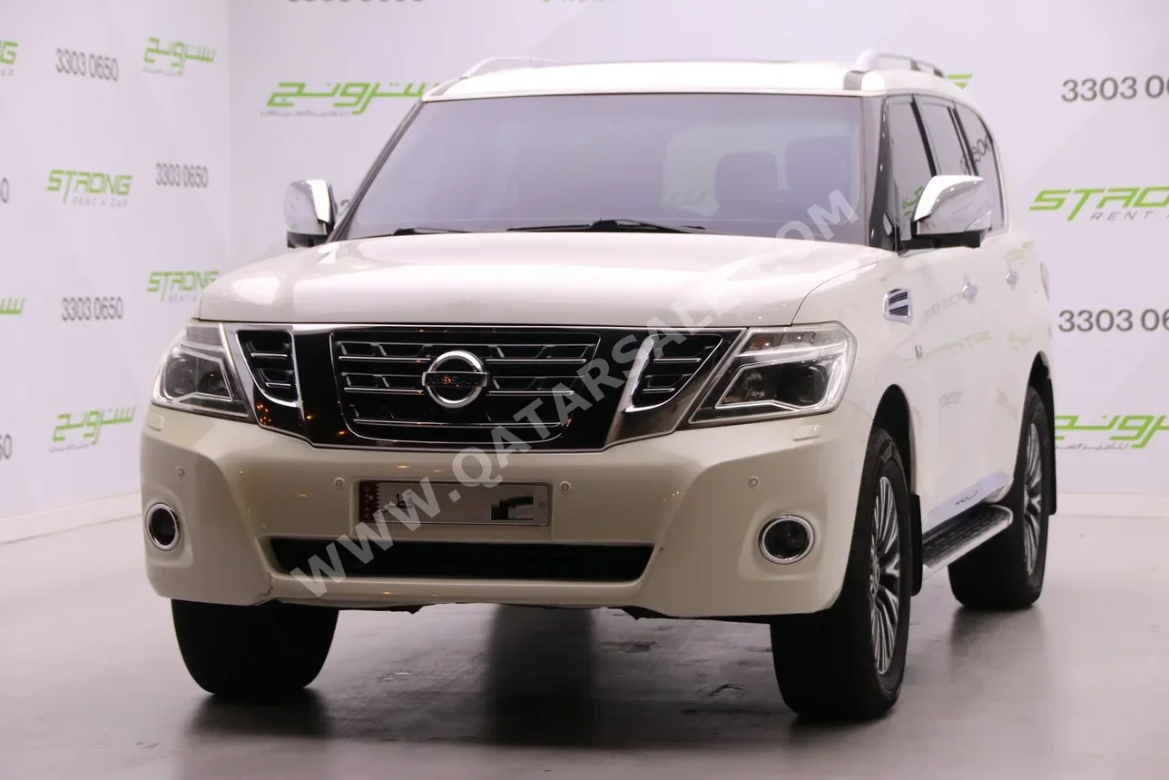 Nissan Patrol Platinum 2014 Automatic 257,000 Km 8 Cylinder Four Wheel Drive (4WD) SUV White