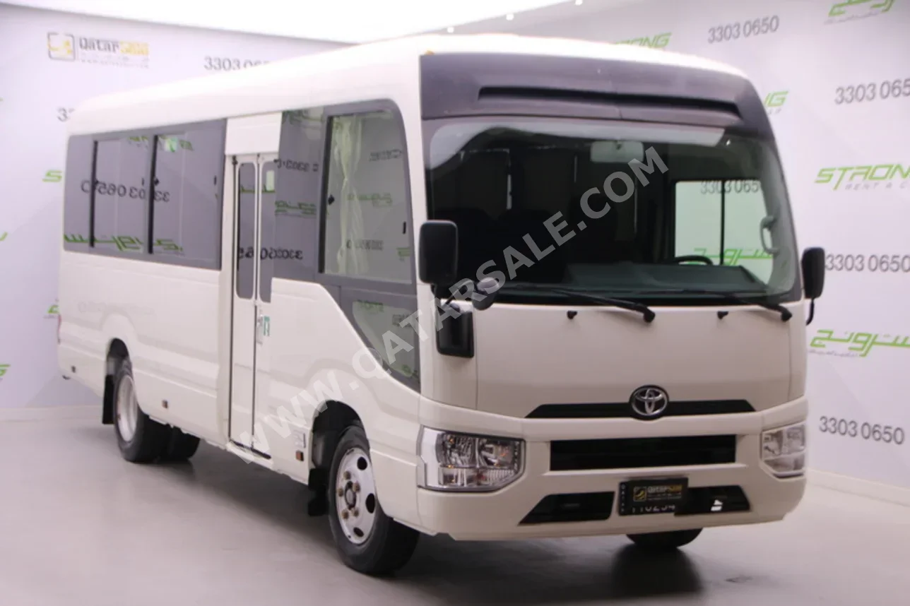 Toyota  Coaster  2022  Manual  249,000 Km  4 Cylinder  Front Wheel Drive (FWD)  Van / Bus  White