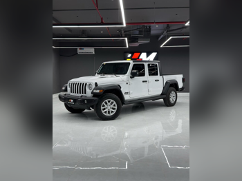 Jeep  Gladiator  Sport  2023  Automatic  8,000 Km  6 Cylinder  Four Wheel Drive (4WD)  Pick Up  White  With Warranty