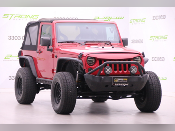 Jeep  Wrangler  Sahara  2012  Automatic  211,000 Km  6 Cylinder  Four Wheel Drive (4WD)  SUV  Red