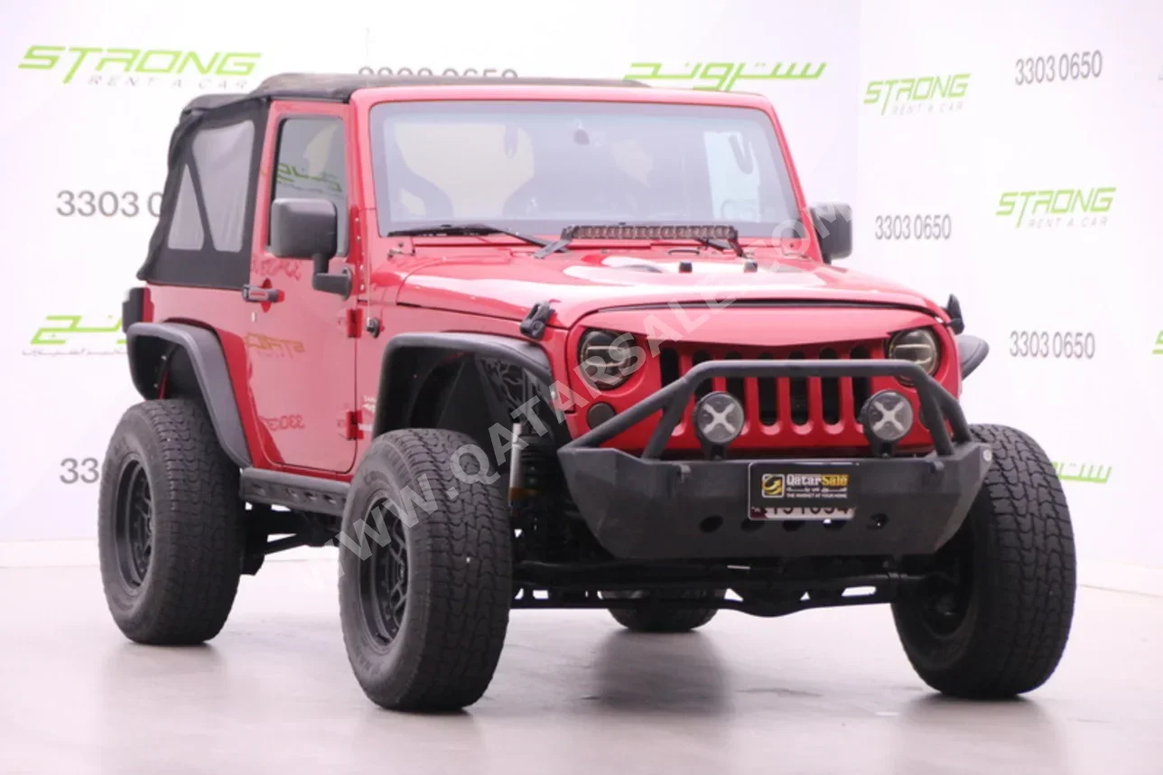 Jeep  Wrangler  Sahara  2012  Automatic  211,000 Km  6 Cylinder  Four Wheel Drive (4WD)  SUV  Red