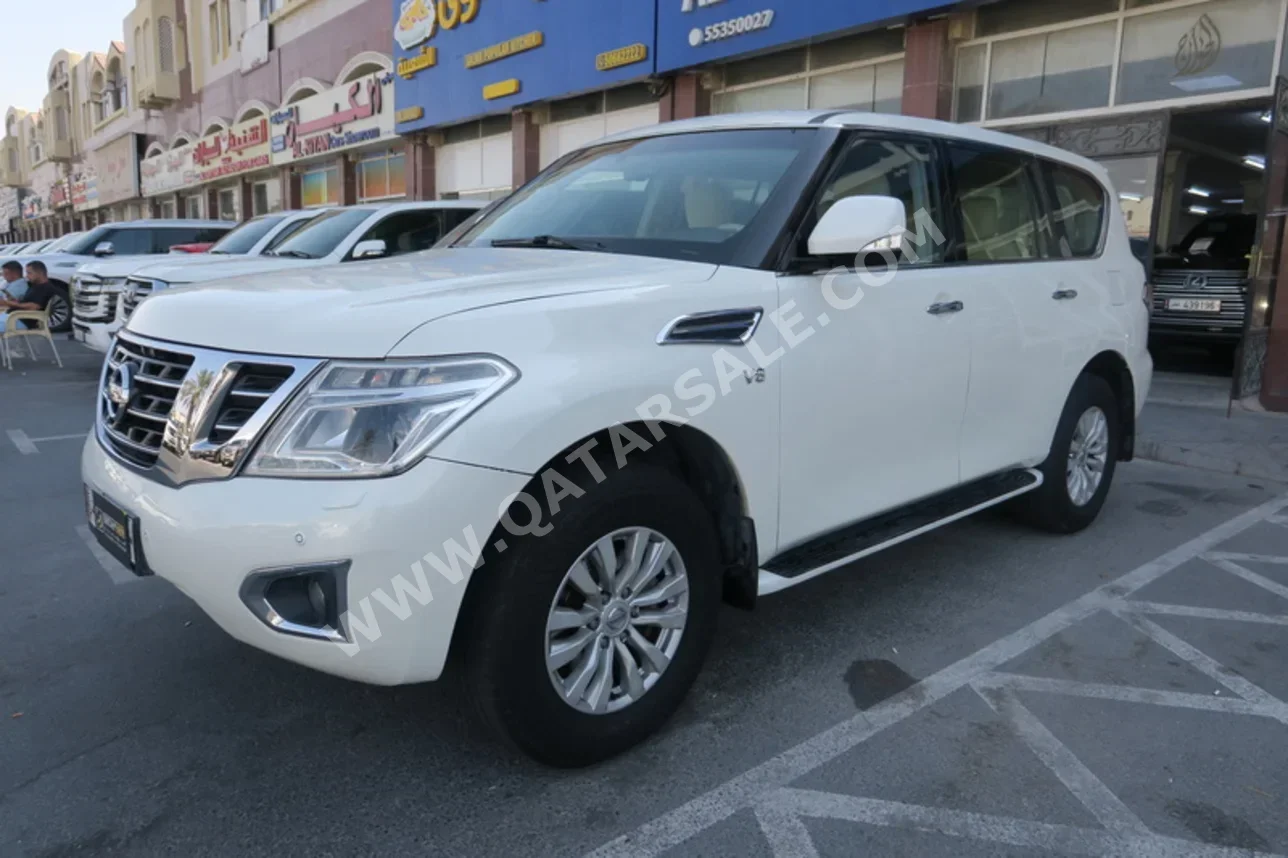 نيسان  باترول  اس اي  2014  اوتوماتيك  350,000 كم  8 سلندر  دفع رباعي  اس يو في  أبيض