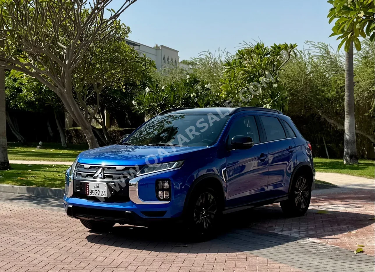 ميتسوبيشي اي اس اكس 2024 اوتوماتيك 2,350 كم 4 سلندر سحب امامي اس يو في ازرق تحت الضمان