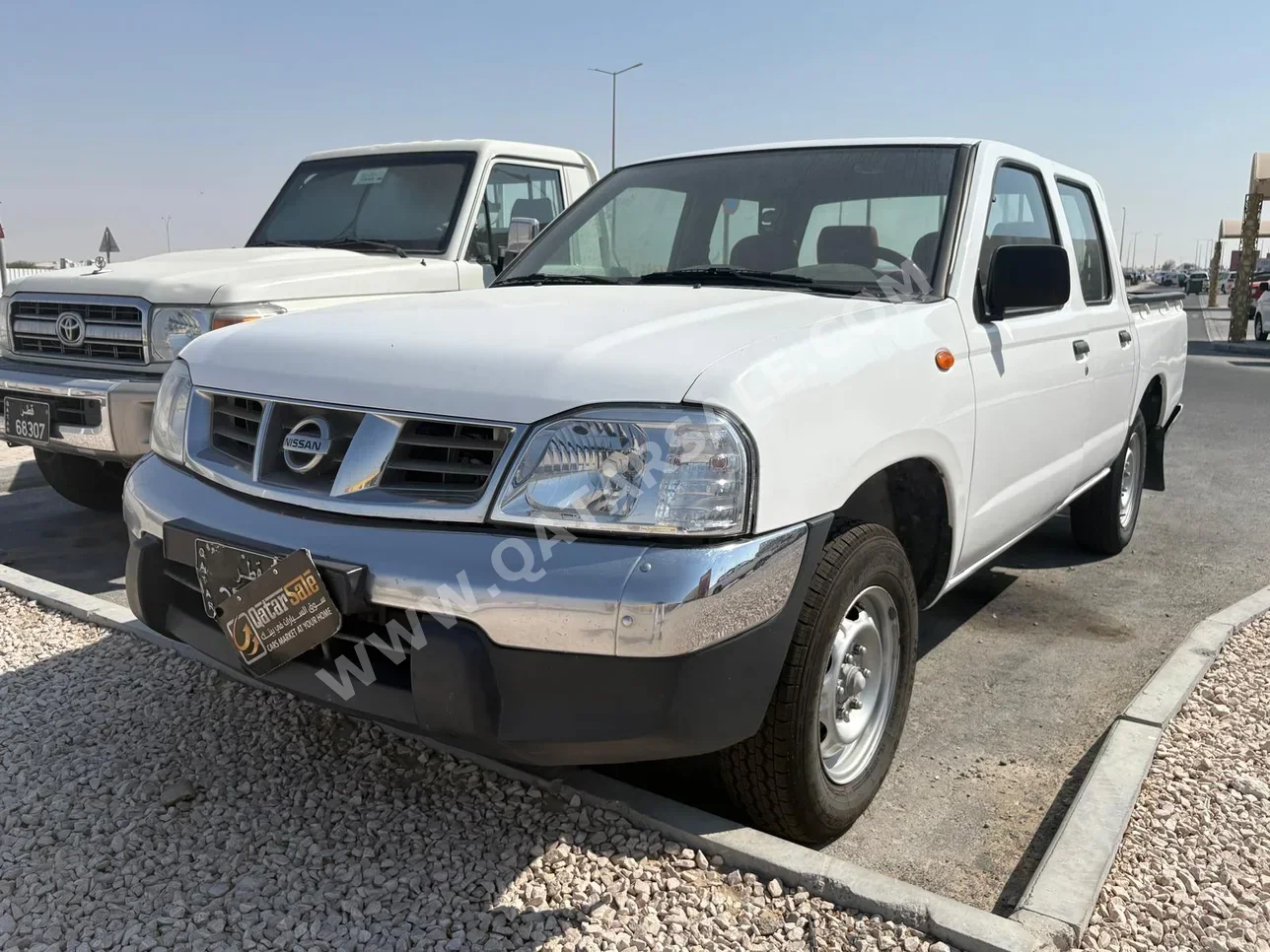 نيسان  بيك أب  2013  عادي  216,000 كم  4 سلندر  دفع خلفي  بيكب  أبيض