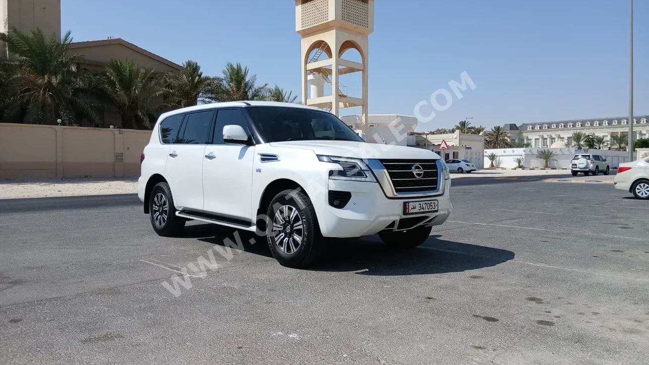 نيسان  باترول  ال اي  2020  اوتوماتيك  99,000 كم  8 سلندر  دفع رباعي  اس يو في  أبيض