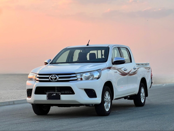 Toyota  Hilux  SR5  2022  Manual  143,000 Km  4 Cylinder  Rear Wheel Drive (RWD)  Pick Up  White