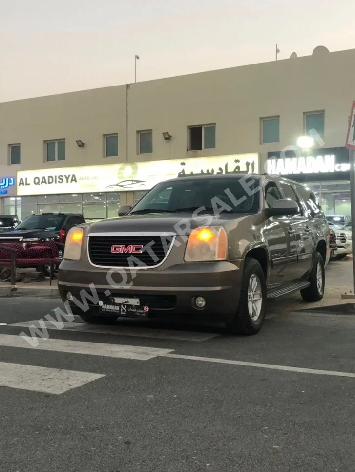 جي ام سي  يوكون  اكس إل  2012  اوتوماتيك  99,000 كم  8 سلندر  دفع رباعي  اس يو في  رمادي