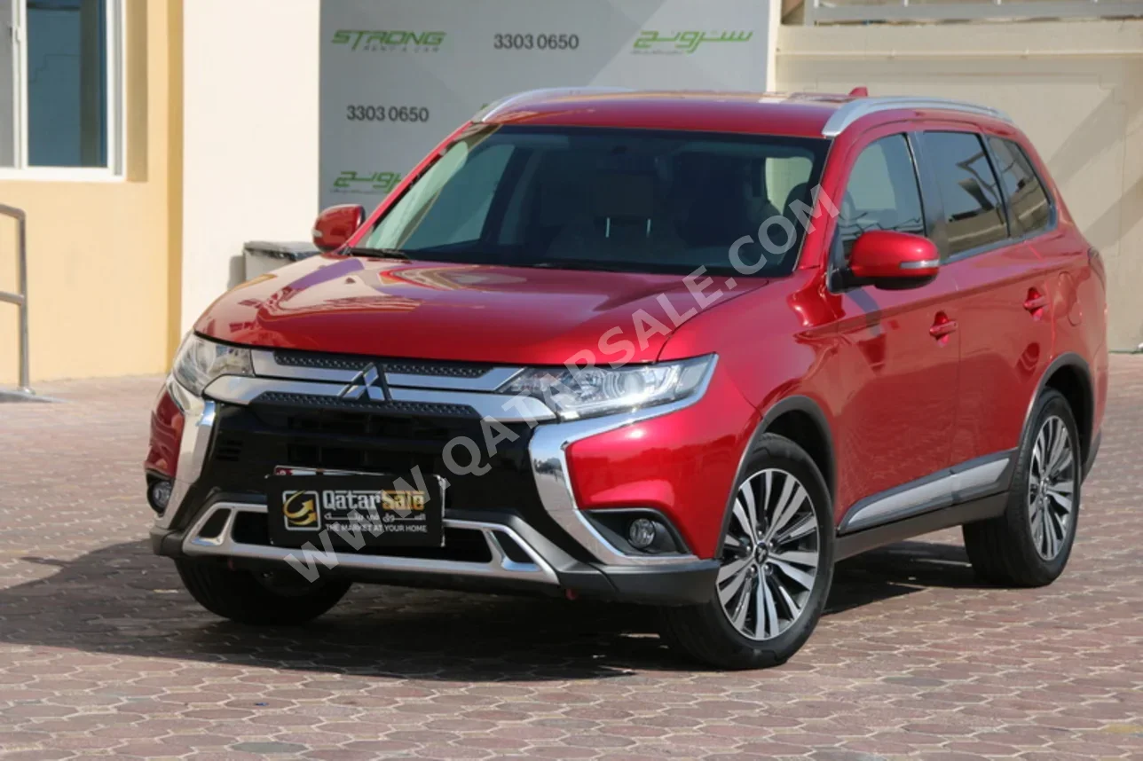 ميتسوبيشي أوت لاندر 2020 اوتوماتيك 114,000 كم 4 سلندر دفع رباعي اس يو في عنابي
