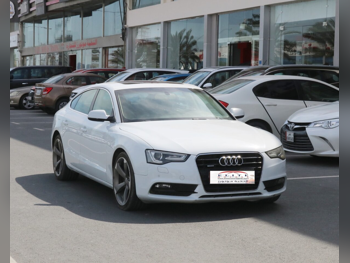 Audi  A5  2.0 T  2014  Automatic  89,000 Km  4 Cylinder  Rear Wheel Drive (RWD)  Sedan  White