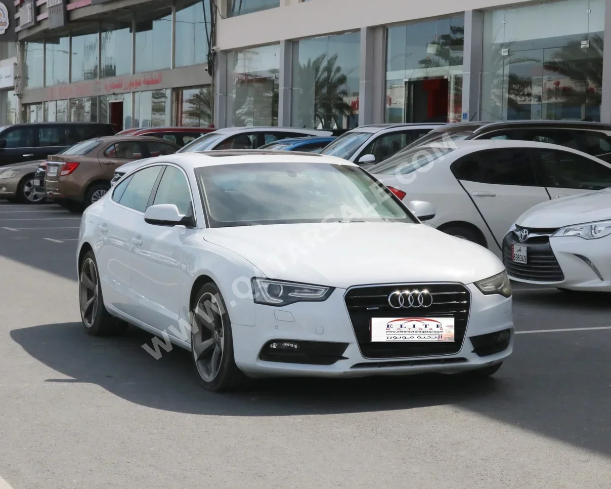 Audi  A5  2.0 T  2014  Automatic  89,000 Km  4 Cylinder  Rear Wheel Drive (RWD)  Sedan  White
