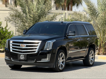 Cadillac  Escalade  Premium  2015  Automatic  165,000 Km  8 Cylinder  All Wheel Drive (AWD)  SUV  Black