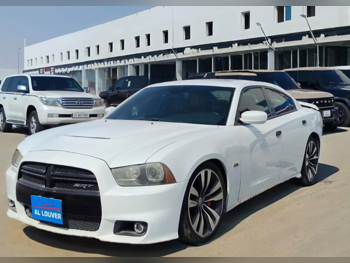 Dodge  Charger  SRT 8  2012  Automatic  122,000 Km  8 Cylinder  Rear Wheel Drive (RWD)  Sedan  White