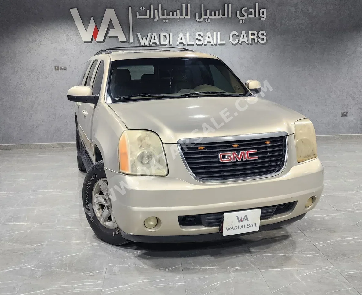 GMC  Yukon  2009  Automatic  228,000 Km  8 Cylinder  Four Wheel Drive (4WD)  SUV  Gold