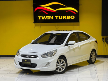 هيونداي  اكسنت  1.6  2015  اوتوماتيك  167,000 كم  4 سلندر  سحب امامي  سيدان  أبيض