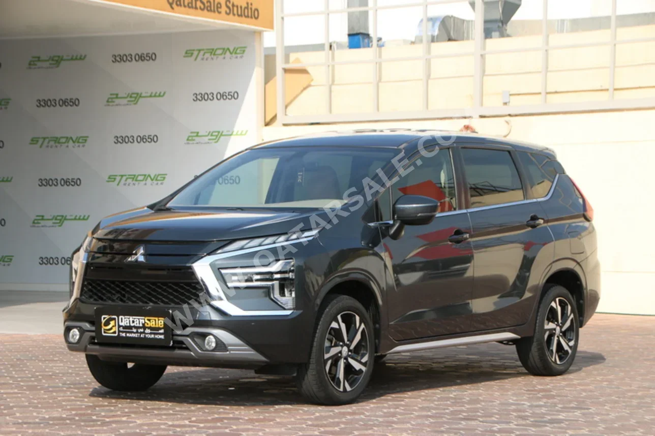 Mitsubishi  Xpander  2023  Automatic  56,000 Km  4 Cylinder  Front Wheel Drive (FWD)  SUV  Gray  With Warranty