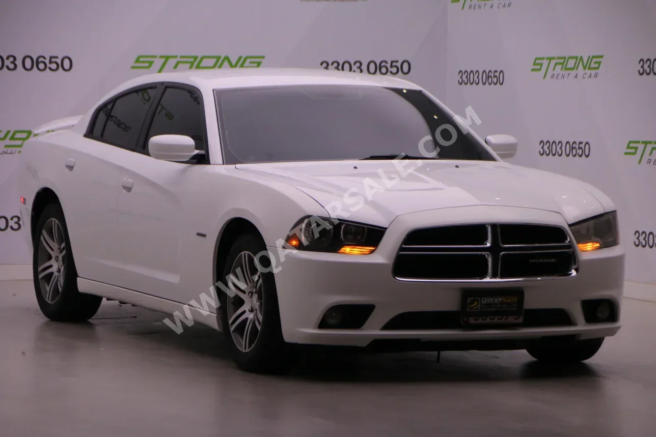 Dodge  Charger  RT  2013  Automatic  76,000 Km  8 Cylinder  Rear Wheel Drive (RWD)  Sedan  White