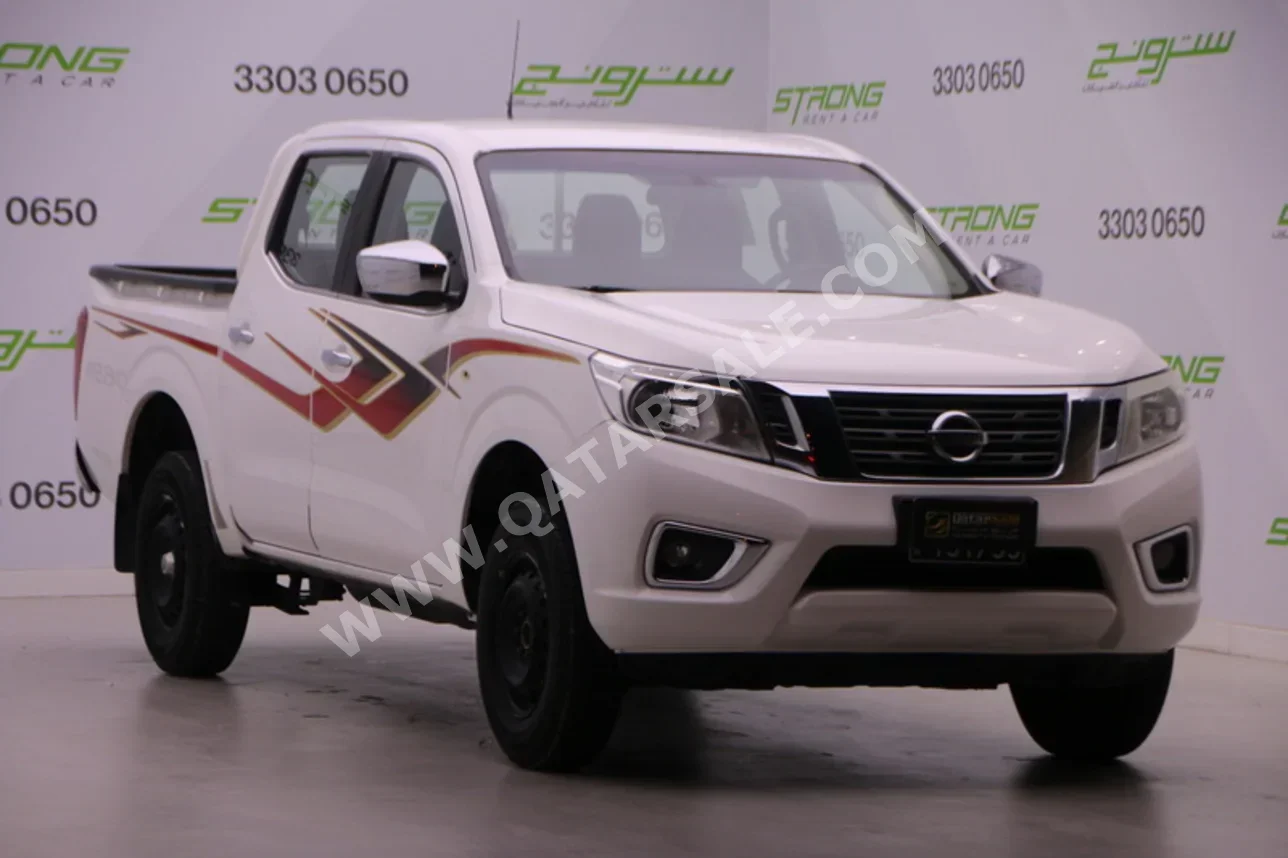 Nissan  Navara  SE  2020  Manual  89,000 Km  4 Cylinder  Rear Wheel Drive (RWD)  Pick Up  White