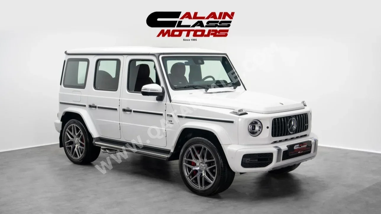 مرسيدس - بنز جي - كلاس 63 اي ام جي 2024 اوتوماتيك 8,068 كم 8 سلندر دفع رباعي اس يو في أبيض