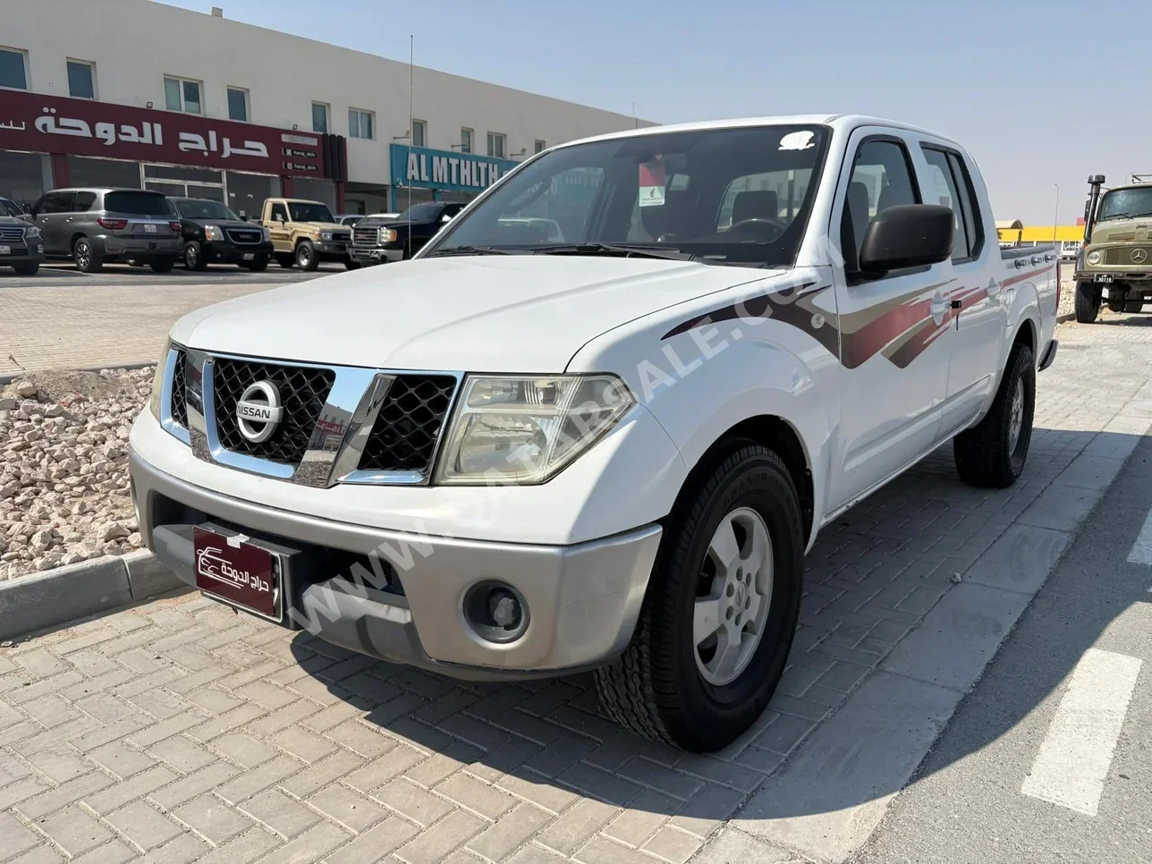 نيسان  نافارا  أس اي  2012  عادي  290,000 كم  4 سلندر  دفع خلفي  بيكب  أبيض