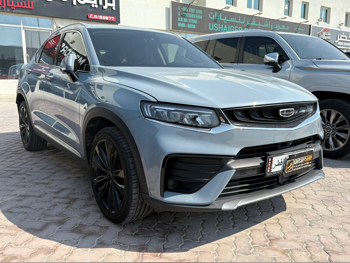 جيلي توجيلا 2023 اوتوماتيك 70,000 كم 4 سلندر دفع رباعي اس يو في رمادي تحت الضمان