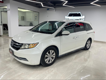 هوندا أوديسي 2015 اوتوماتيك 257,000 كم 6 سلندر سحب امامي فان \ باص أبيض