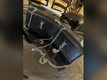 شنطة يد  - سانت لوران  - أسود  - جلد صناعي  - نسائي