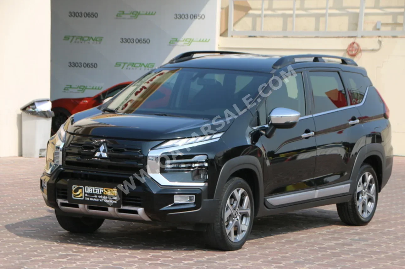 ميتسوبيشي اكس باندر كروس 2024 اوتوماتيك 66,000 كم 4 سلندر دفع رباعي اس يو في أسود تحت الضمان