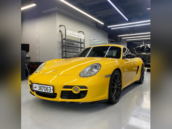 بورش كايمان اس 2008 اوتوماتيك 110,000 كم 6 سلندر دفع خلفي كوبيه \ سبورت أصفر تحت الضمان