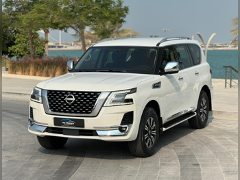 نيسان  باترول  أكس أي  2020  اوتوماتيك  90,000 كم  6 سلندر  دفع رباعي  اس يو في  أبيض