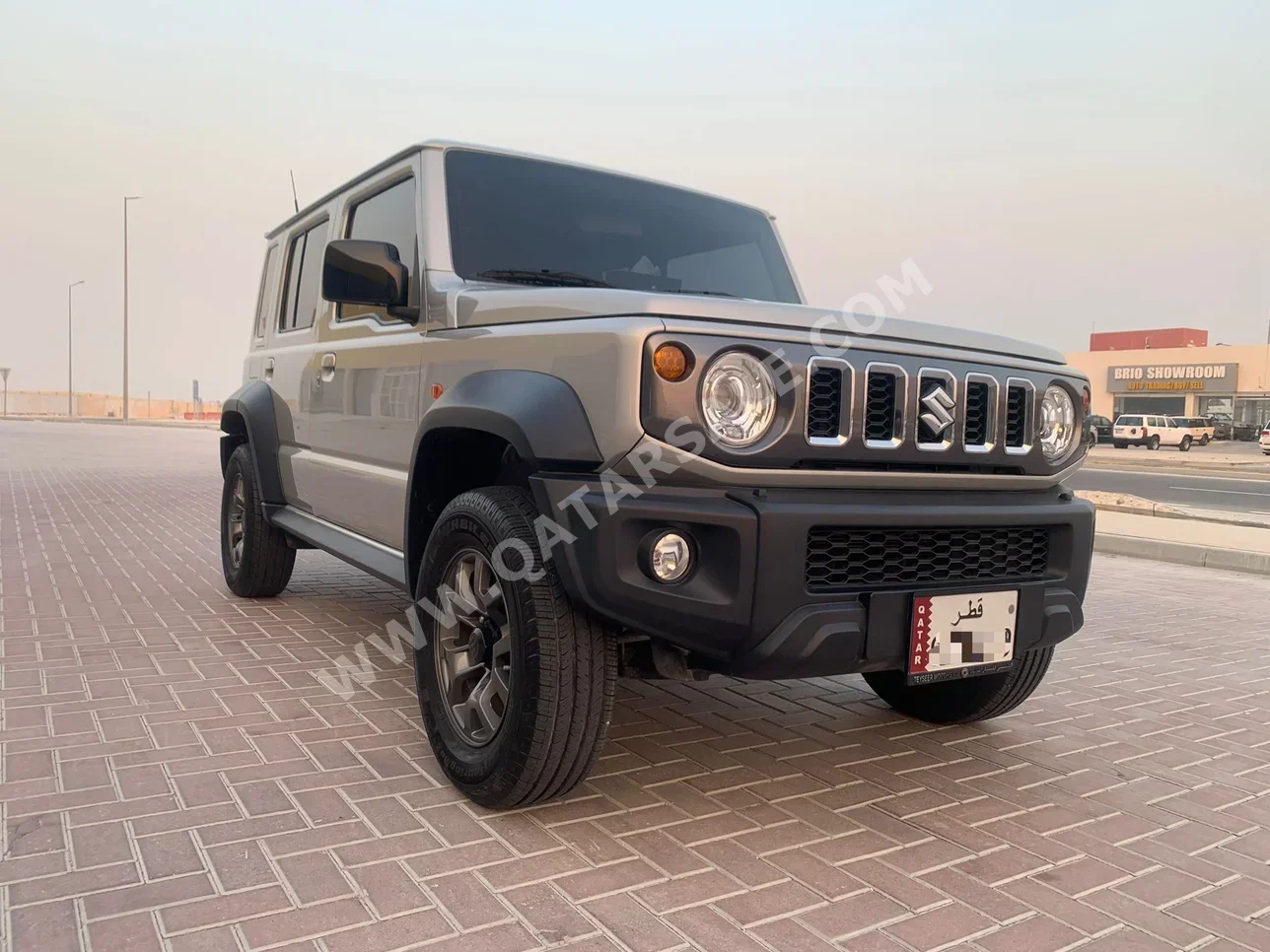 Suzuki  Jimny  2024  Automatic  7,000 Km  4 Cylinder  Four Wheel Drive (4WD)  SUV  Light Gray  With Warranty