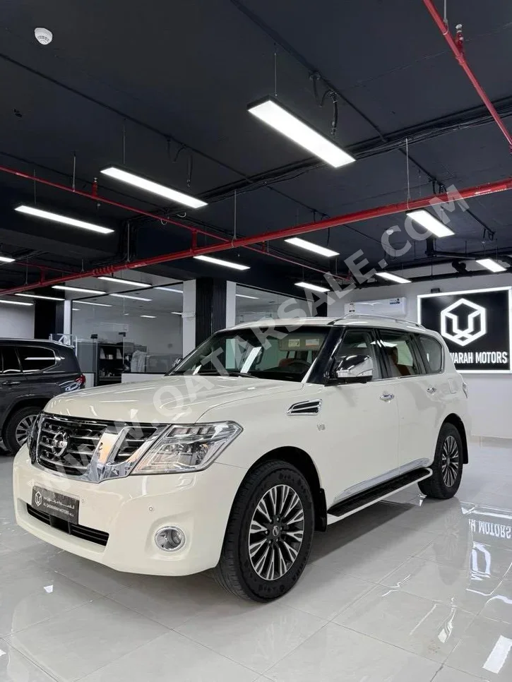 نيسان  باترول  بلاتنيوم  2014  اوتوماتيك  440,000 كم  8 سلندر  دفع رباعي  اس يو في  فضي