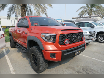 Toyota  Tundra  TRD  2018  Automatic  140,000 Km  8 Cylinder  Four Wheel Drive (4WD)  Pick Up  Orange