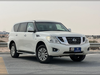 Nissan  Patrol  SE  2014  Automatic  292,000 Km  8 Cylinder  Four Wheel Drive (4WD)  SUV  White