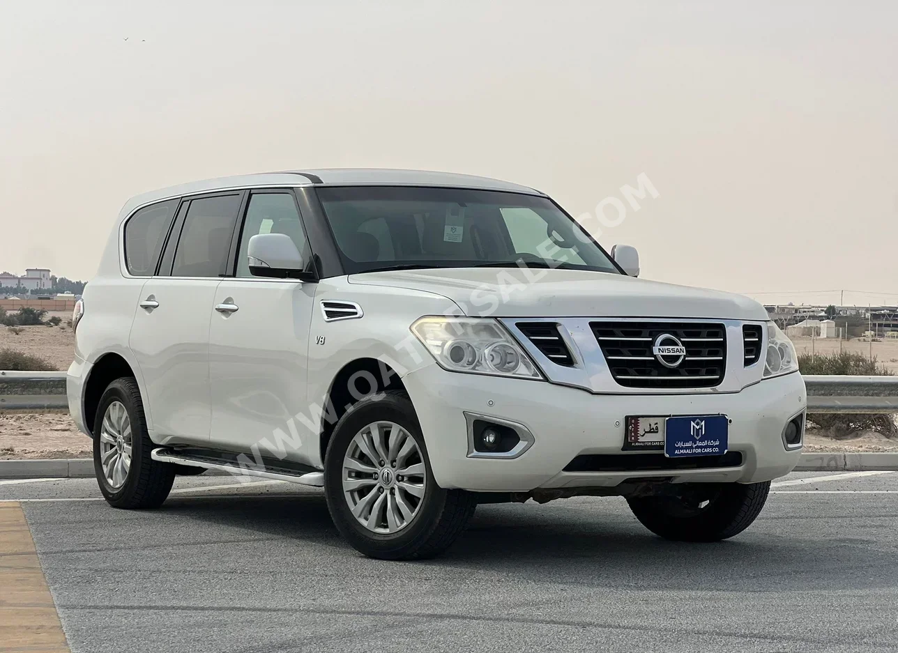 نيسان  باترول  اس اي  2014  اوتوماتيك  292,000 كم  8 سلندر  دفع رباعي  اس يو في  أبيض