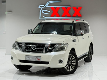 Nissan  Patrol  Platinum  2014  Automatic  303,000 Km  8 Cylinder  Four Wheel Drive (4WD)  SUV  White