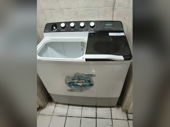 مجموعات الغسالات والمجففات 12 كغ  أبيض  غسالة تحميل علوي  كهرباء
