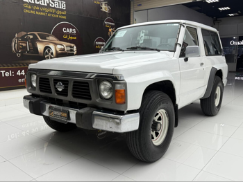 نيسان باترول 1991 عادي 126,000 كم 6 سلندر دفع رباعي اس يو في أبيض