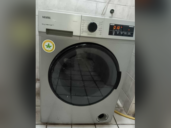 غسالة ملابس & الكل في واحد فيستيل \ غسالة تحميل أمامي اللون الرمادي