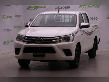 Toyota  Hilux  2019  Manual  107,000 Km  4 Cylinder  Rear Wheel Drive (RWD)  Pick Up  White